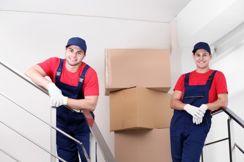 Removal team handling household items during a UK move