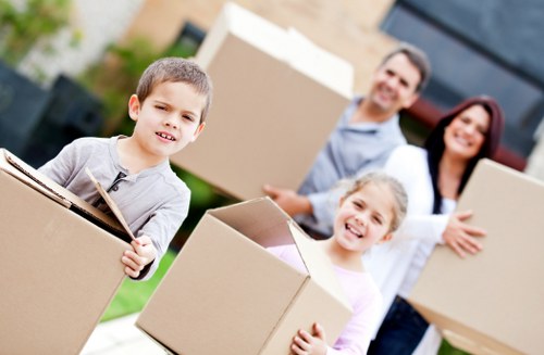 Professional movers handling furniture in a Hollandpark home