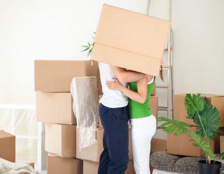 Removal team loading household items in Holland Park for a local move