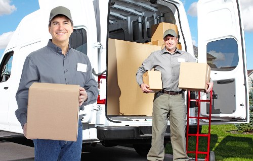 Local removal van prepared for a residential move near Holland Park