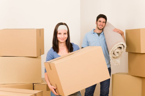 Careful box labelling and wrapping during a local packing service